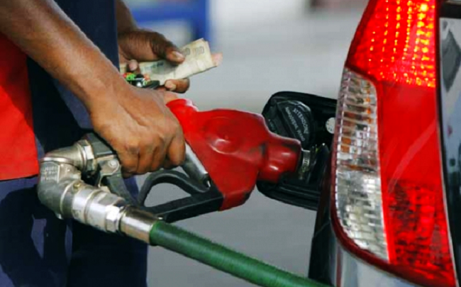 An attendant serving a vehicle